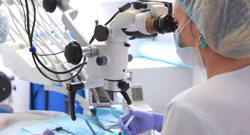 Dental,Microscope.,Treatment,Of,Tooth,Root,Inflammation.,Modern,Dentistry.,Side