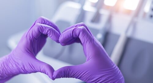 Purple,Latex,Glove,Hands,Forming,Heart,Love,Shape,In,Medical Purple,Latex,Glove,Hands,Forming,Heart,Love,Shape,In,Medical